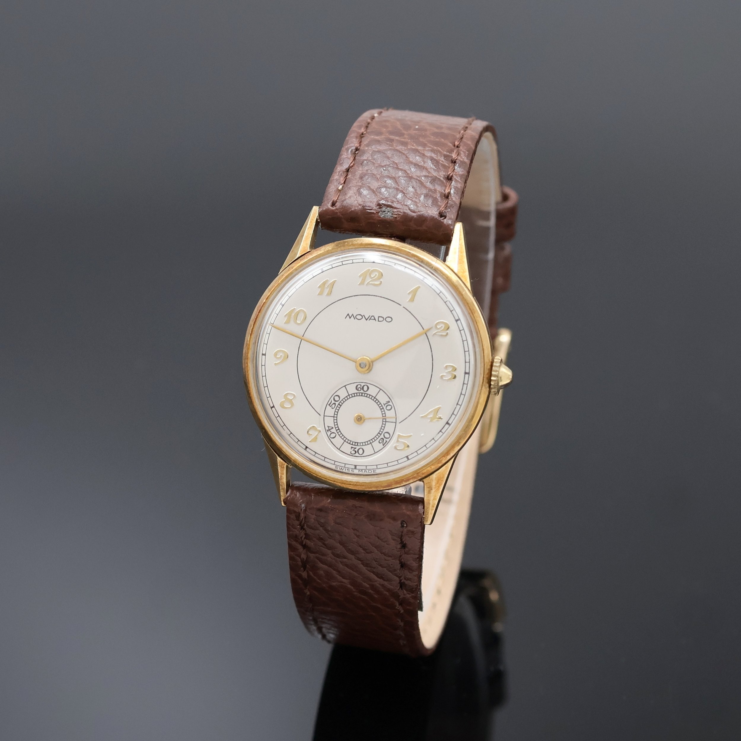 MOVADO 9k yellow gold wristwatch, Swi... | Watches and timepieces: bids
