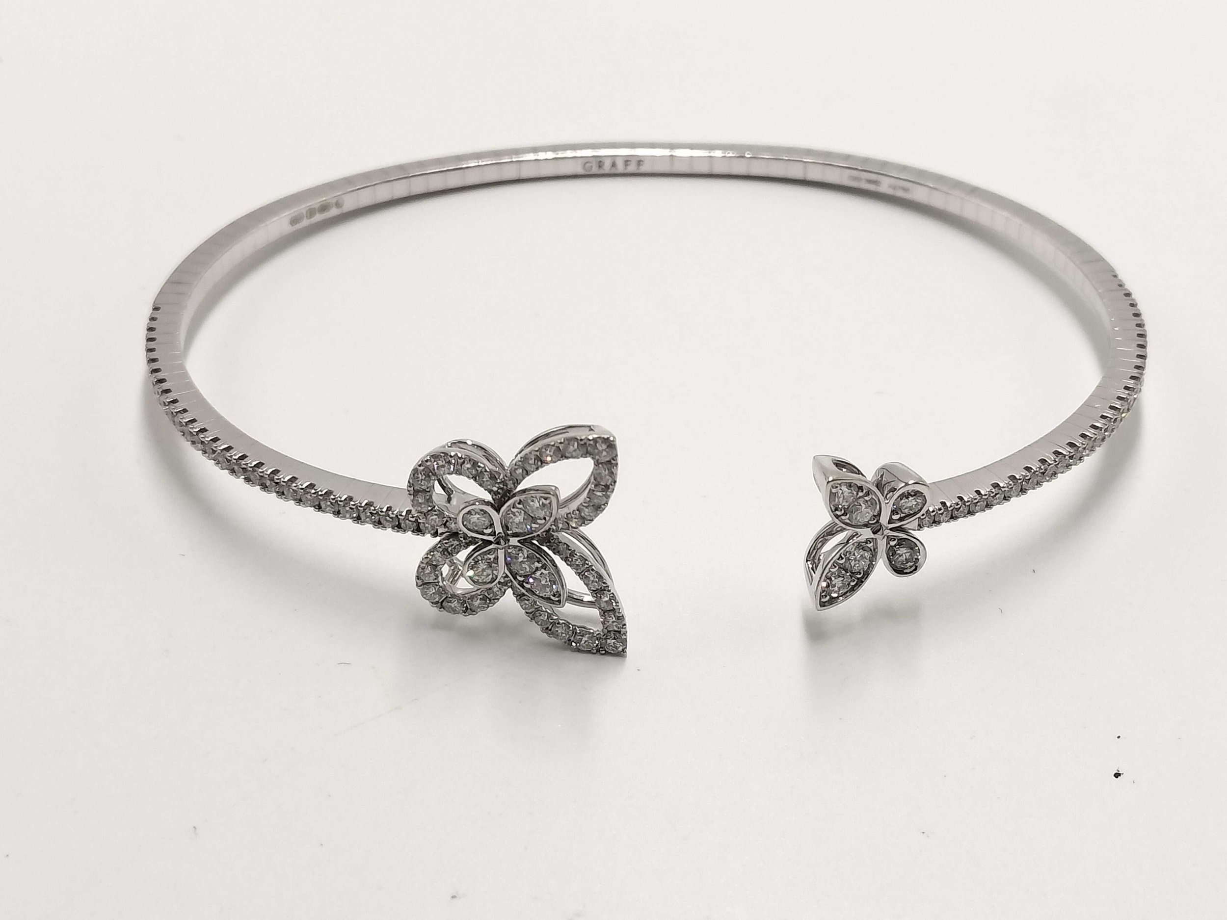 Bracelet rigide ouvert Graff Butterfly en or b... | Bracelets: enchères