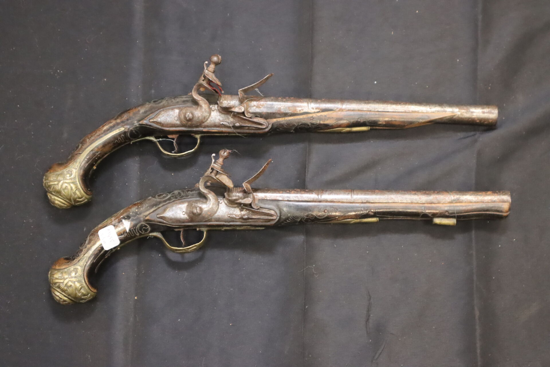 Pair of Arçon flintlock pistolsLong barrels, round loc... | Arms: bids