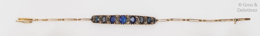 Null Bracelet articulé en or jaune et argent, orné d’un saphir, de pierres bleue&hellip;