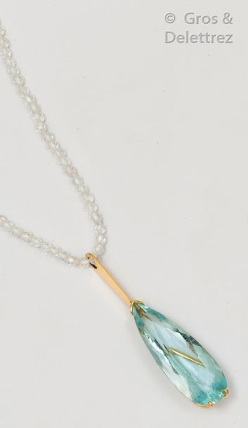 Null Pendant necklace in yellow gold, adorned with a pear cut aquamarine. The ne&hellip;
