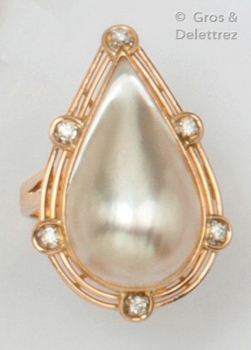 Null Ring " Goutte " in 14K yellow gold, adorned with a pear-shaped pear in a pa&hellip;