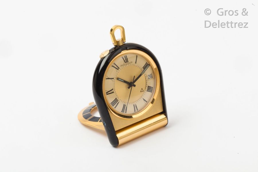 JAEGER LECOULTRE Gold-plated and partially black enamelled travel alarm clock. R&hellip;