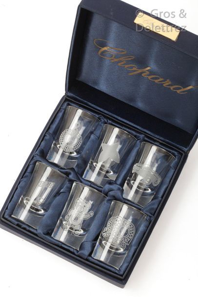 CHOPARD Set of six decorated, engraved glasses. Signed Chopard. With case.