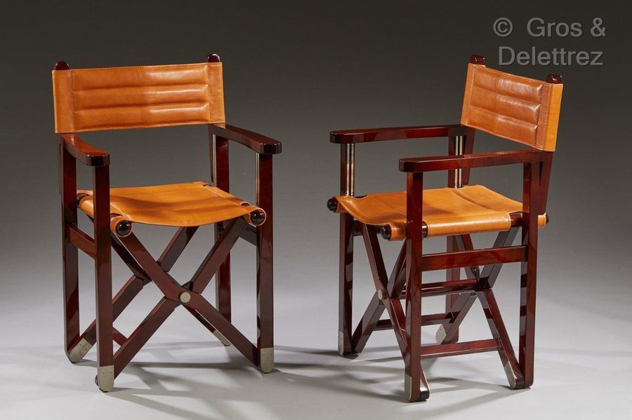 RENA DUMAS (1937-2009) 一对"导演"扶手椅，漆黑紫檀木和银铜色，椅背和座椅均为拉伸的橙棕色皮革。

1980年左右

高：88 / 宽：5&hellip;