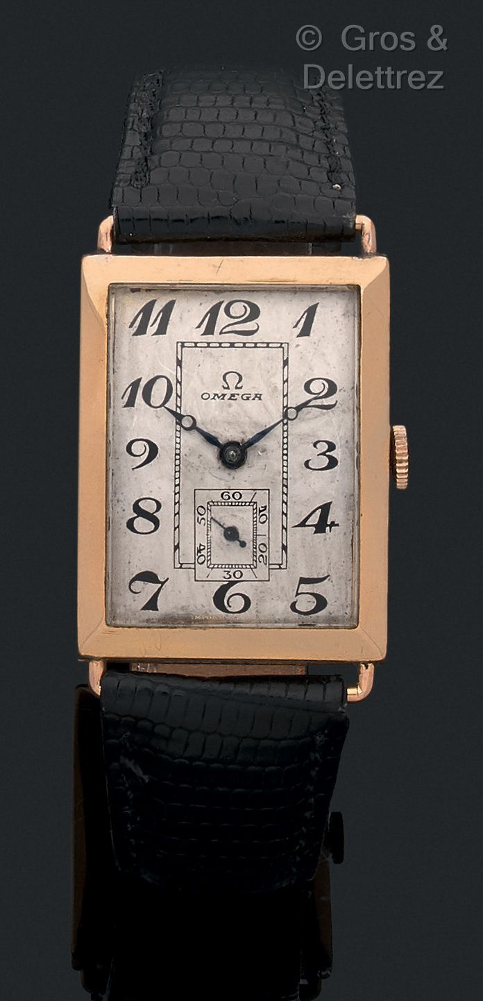 OMEGA Rectangle. Circa 1920. 

Rare 18K gold rectangle model. Silvered dial, ena&hellip;