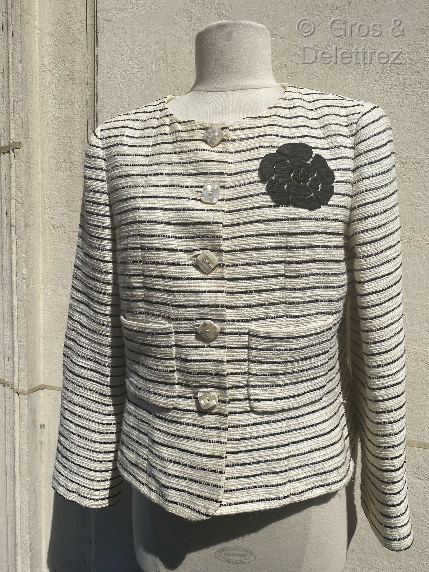 CHANEL Circa 2001

Short jacket in ecru tweed with tone-on-tone stripes, intersp&hellip;
