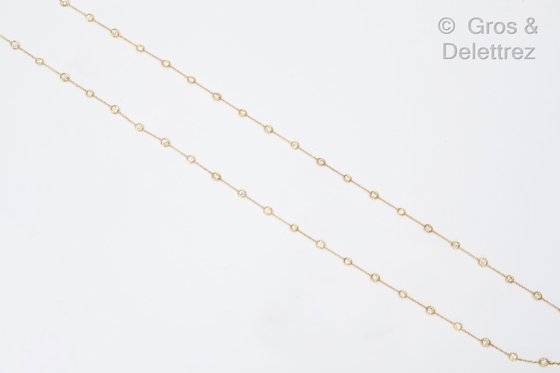 Null A large yellow gold sautoir, consisting of a chain of forçat links alternat&hellip;