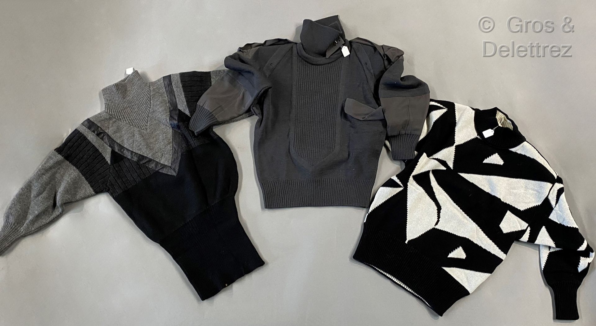 Null CLAUDE MONTANA, set of three sweaters in black-grey-white tones