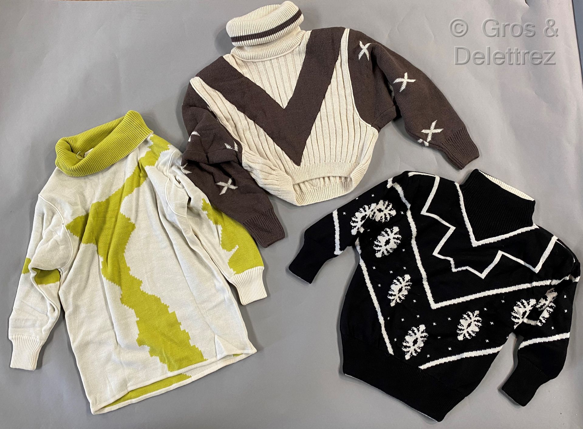 Null CLAUDE MONTANA, set of three wool sweaters in beige, black, brown and green&hellip;