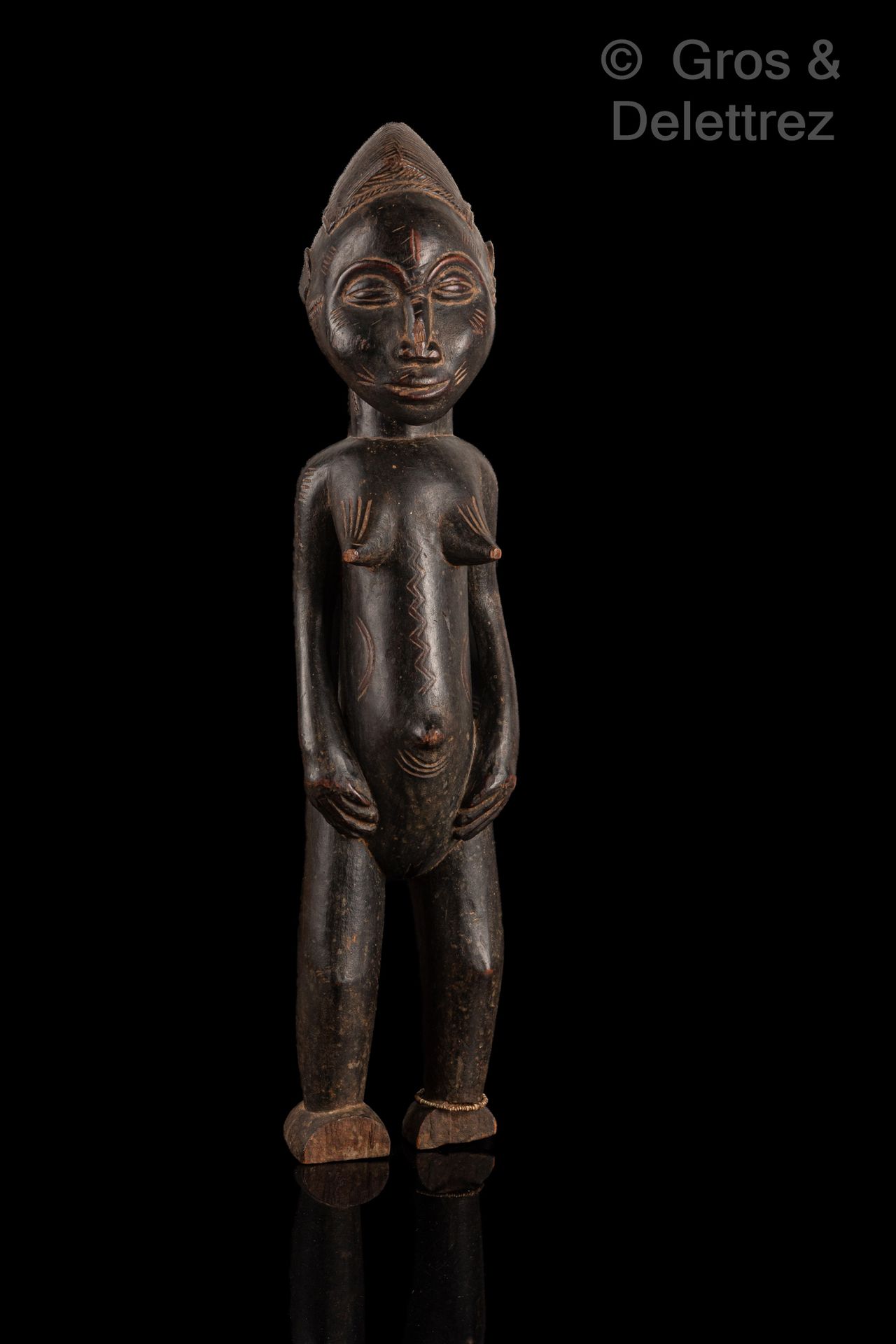 Null Weibliche Statue

Volk der Senufo (Spätstil)

Elfenbeinküste

Holz

H. 59 c&hellip;