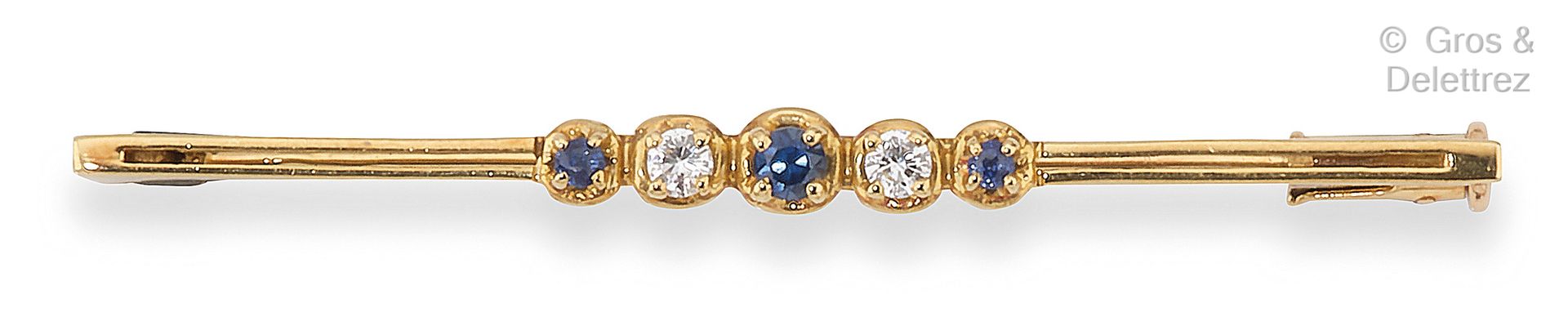 Null 精美的 "Barette "黄金胸针，镶有圆形蓝宝石和明亮式切割钻石。长度：5厘米。毛重：2.9克。