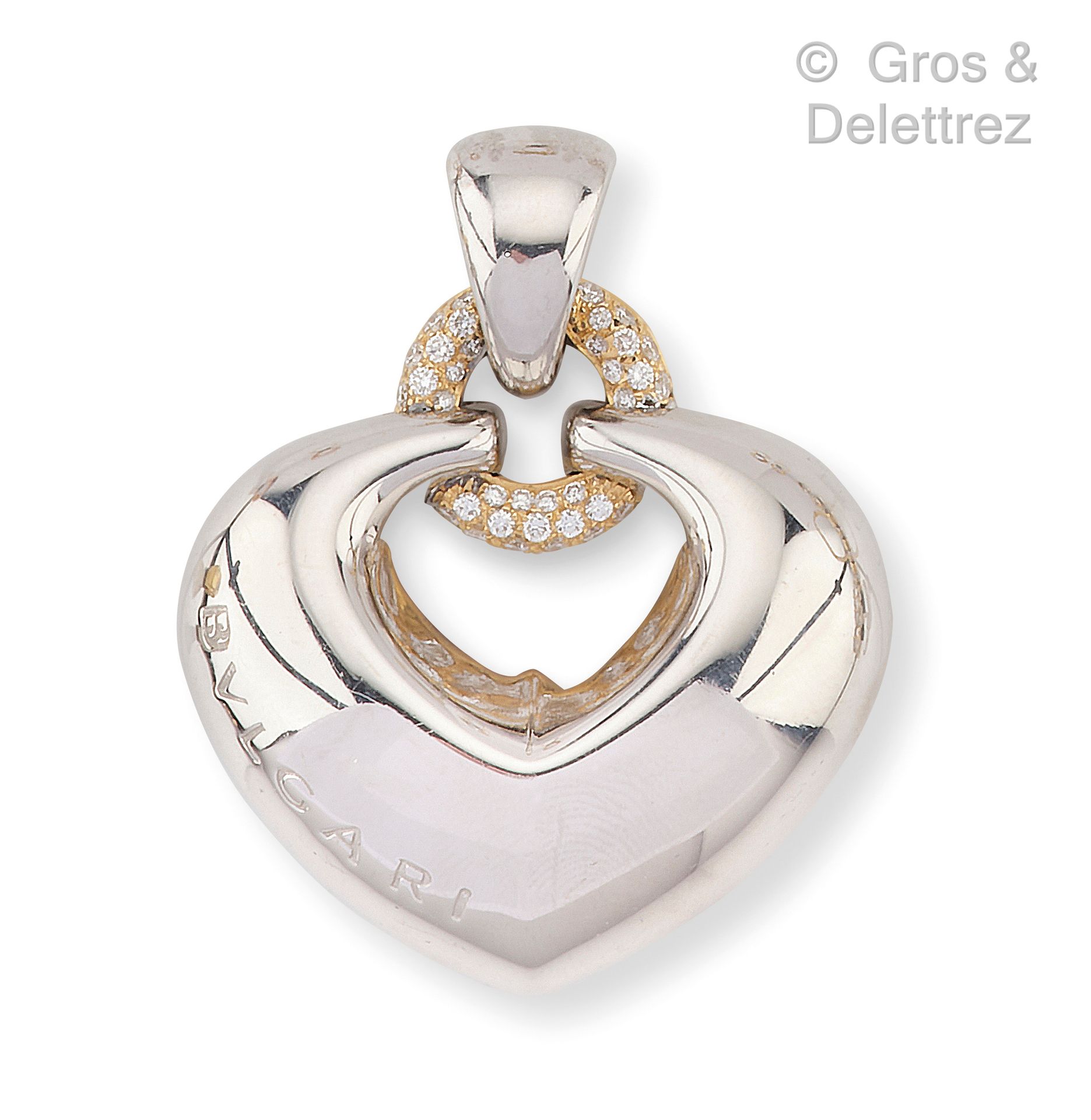 Null BULGARI - Heart pendant in white gold, highlighted by a circular pattern in&hellip;