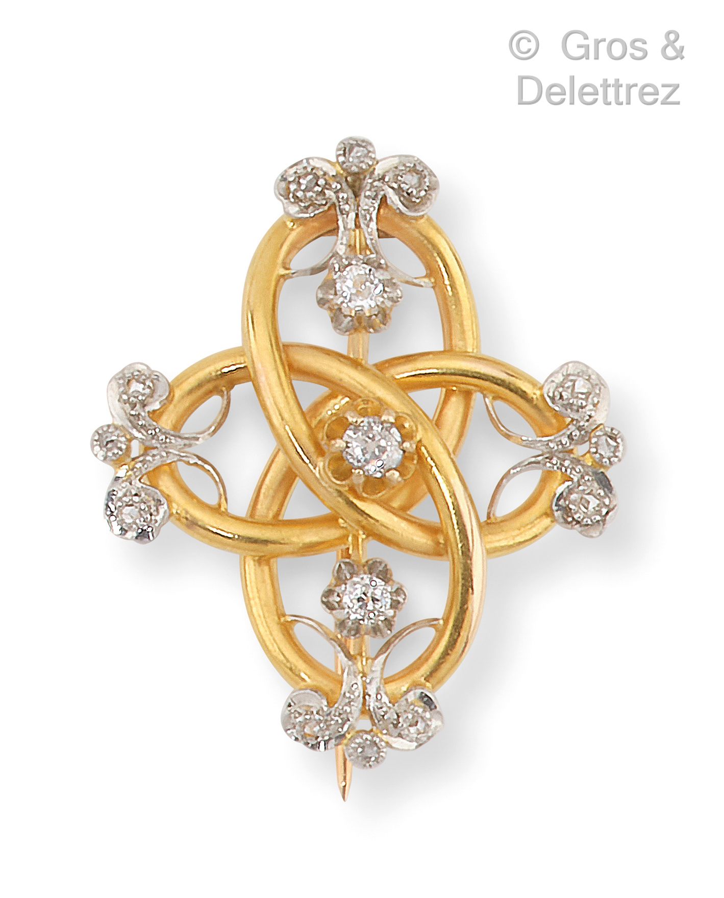 Null Yellow gold "Knot" brooch with scroll decoration set with old-cut diamonds.&hellip;