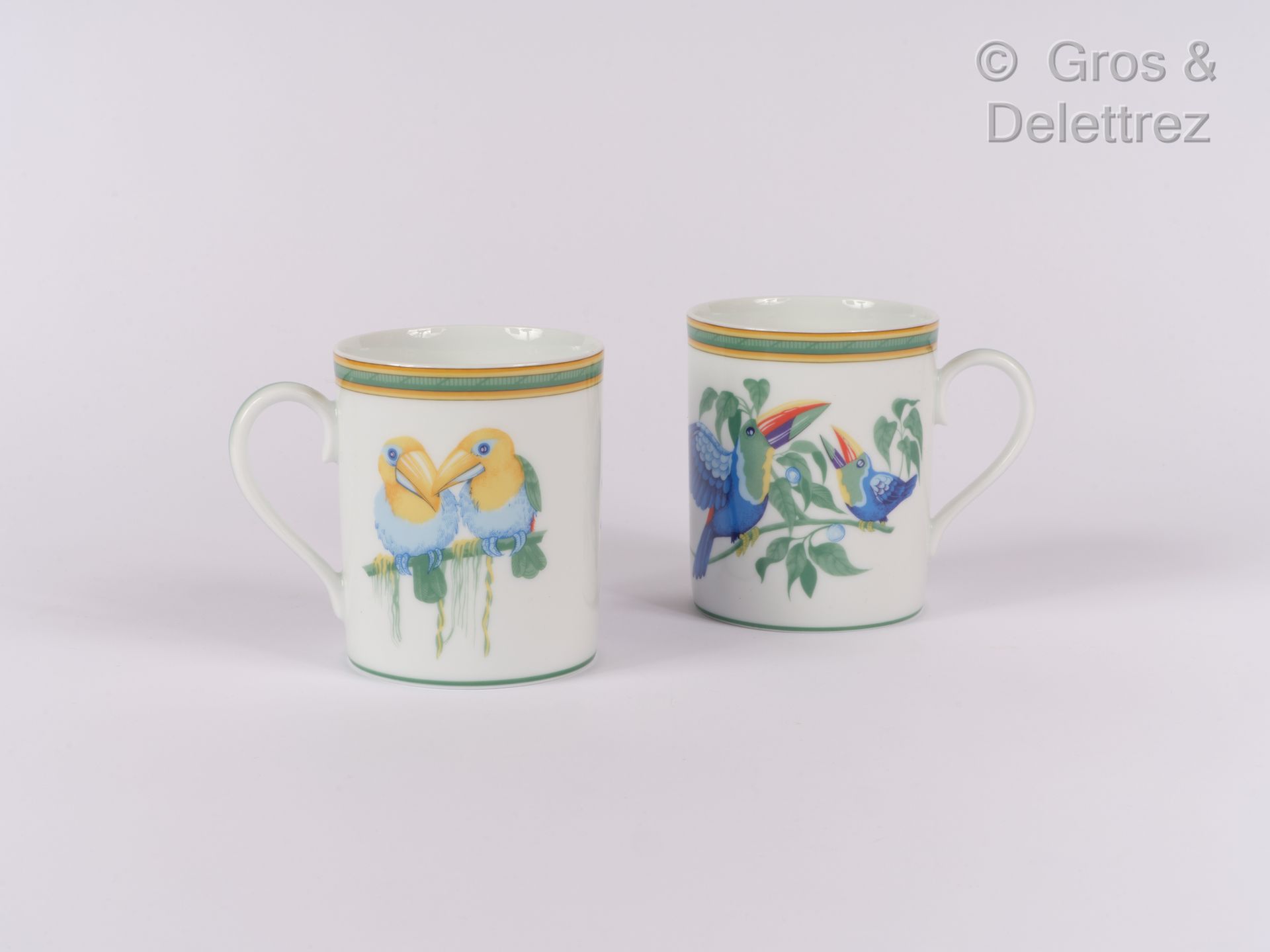 HERMÈS Paris made in France Pair of mugs " Toucans " in porcelain.