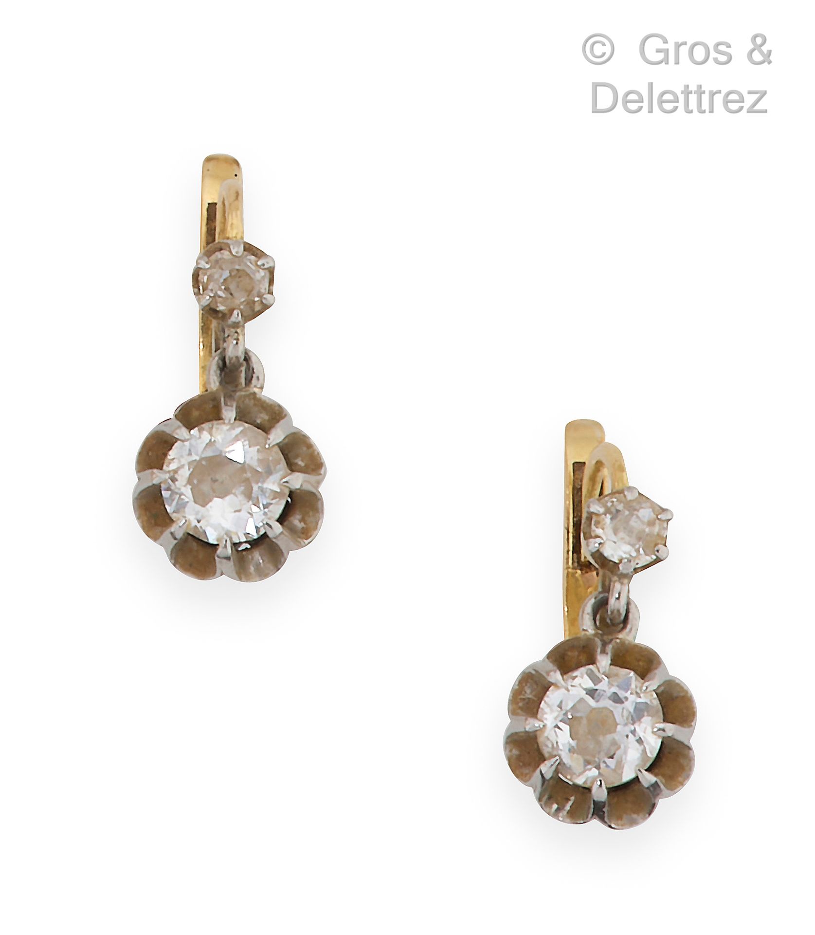 Null Pair of yellow gold "Dormeuses" earrings, set with old-cut diamonds.

Weigh&hellip;