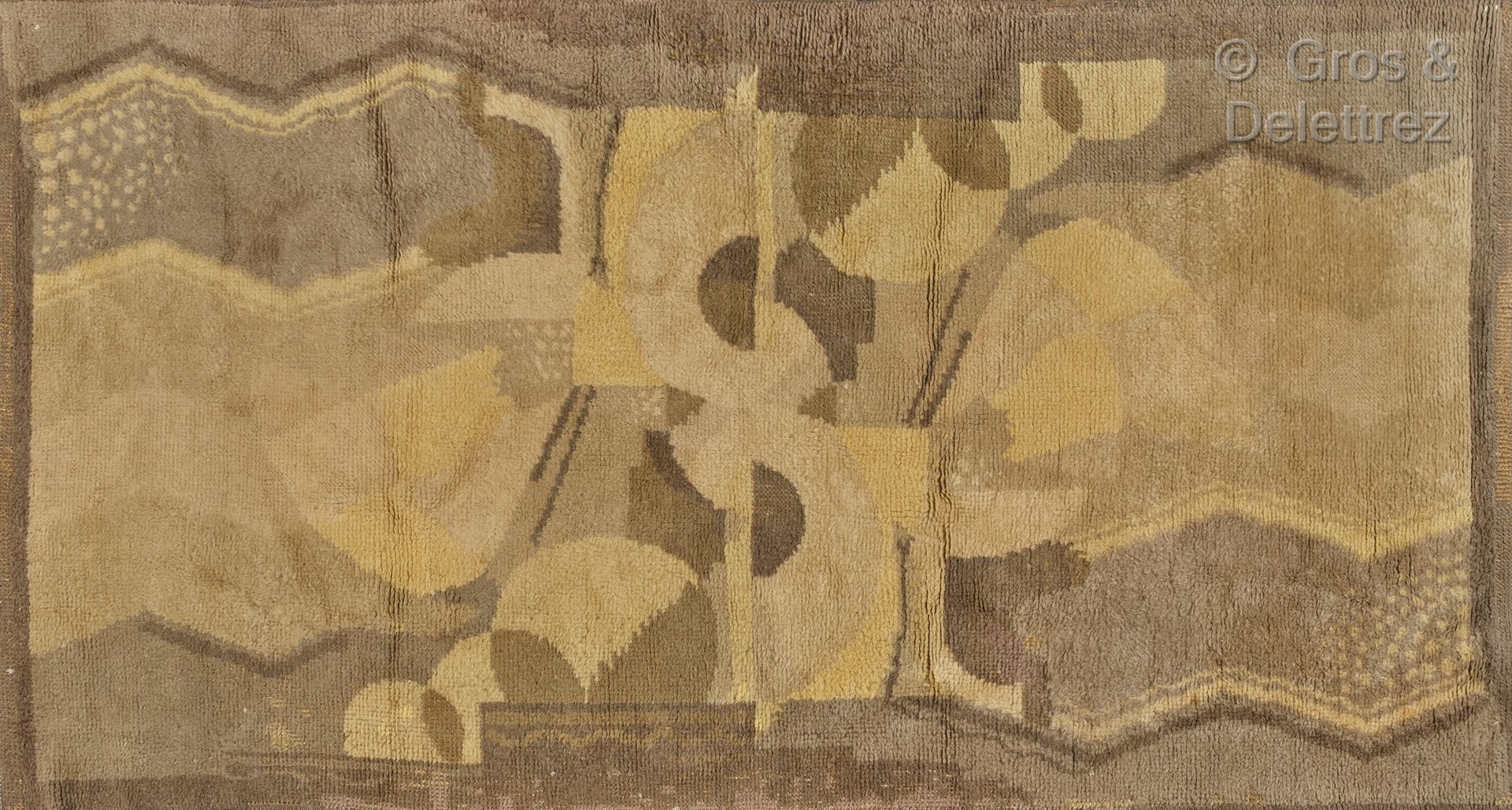 TRAVAIL DES ANNÉES 30 Tappeto in lana con decorazione geometrica.

235 x 125 cm