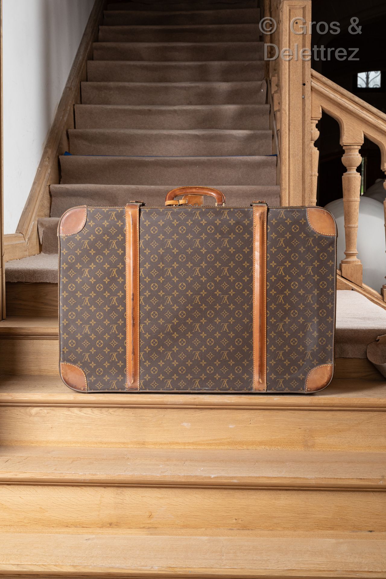 LOUIS VUITTON Suitcase in monogrammed canvas with soft top and brown leather ban&hellip;