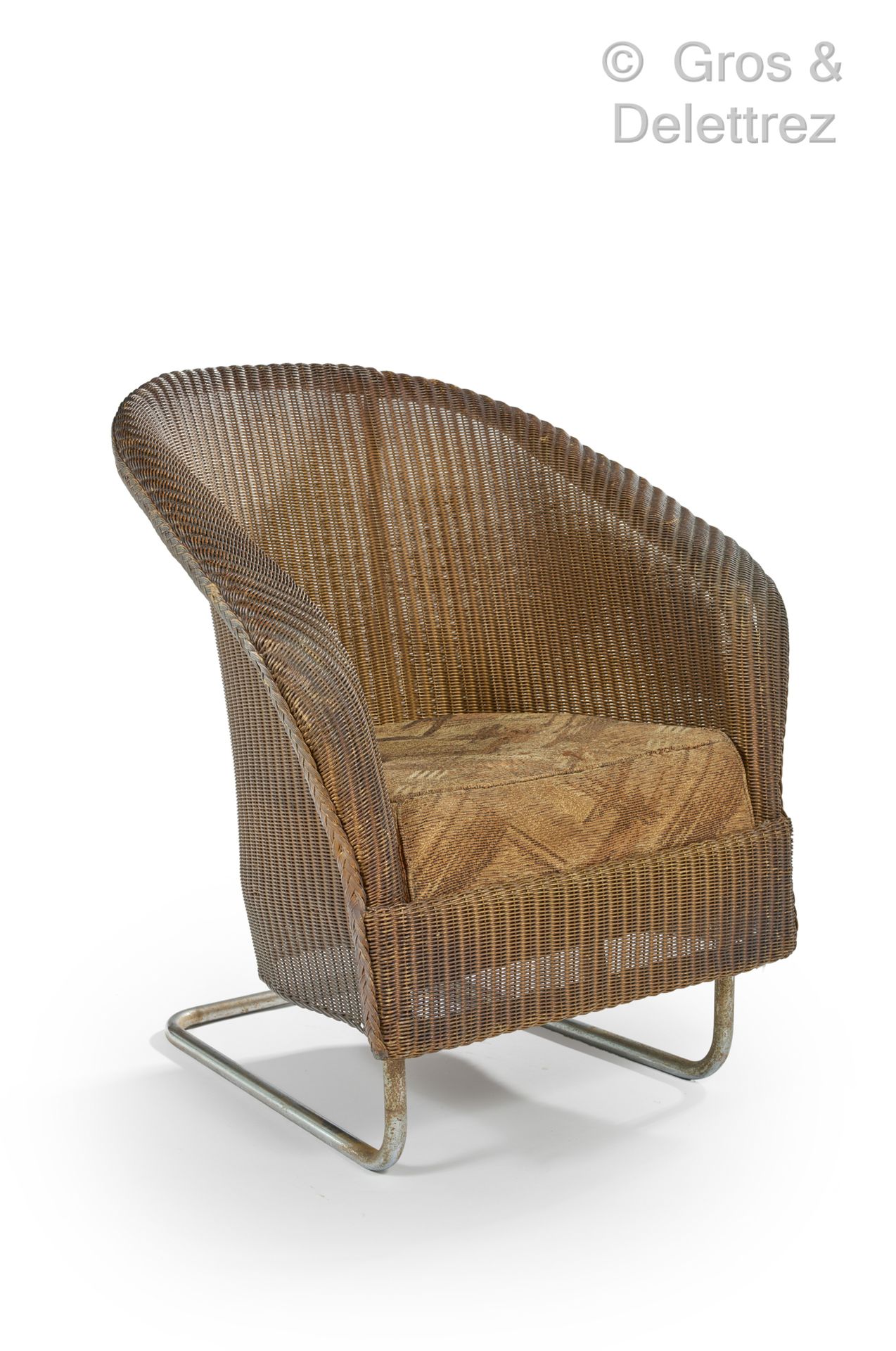 Null W.LUSTY & SONS，劳埃德织机家具，归于

藤制和镀铬管状金属扶手椅

约1930年

高：80厘米，宽：68厘米，深：68厘米