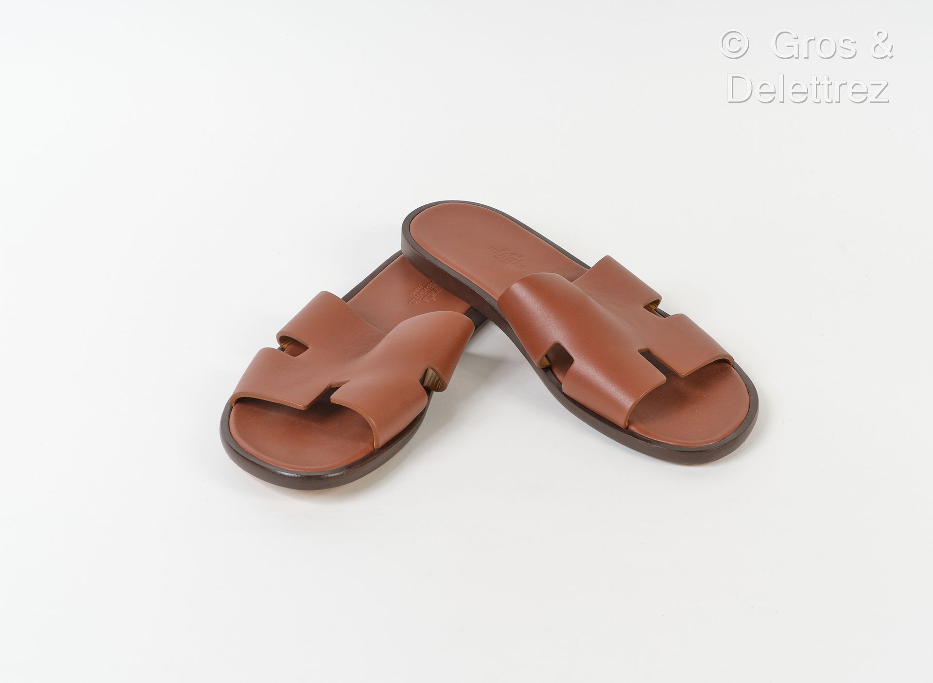 HERMES Paris Made In Italy Pair of "Izmir" sandals in gold calf, leather soles. &hellip;