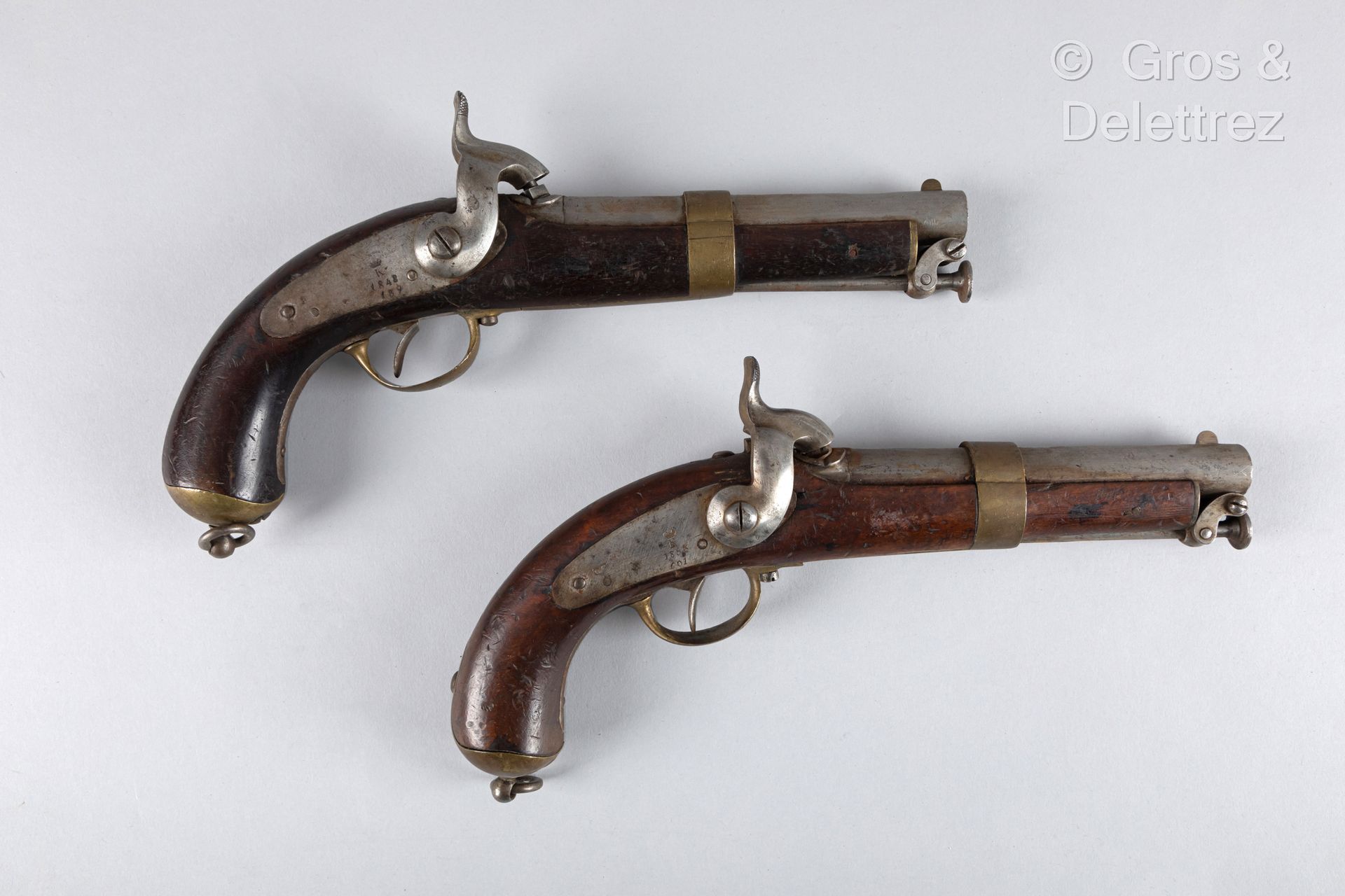 Null Two military percussion pistols that can form a pair; rear locks, one dated&hellip;