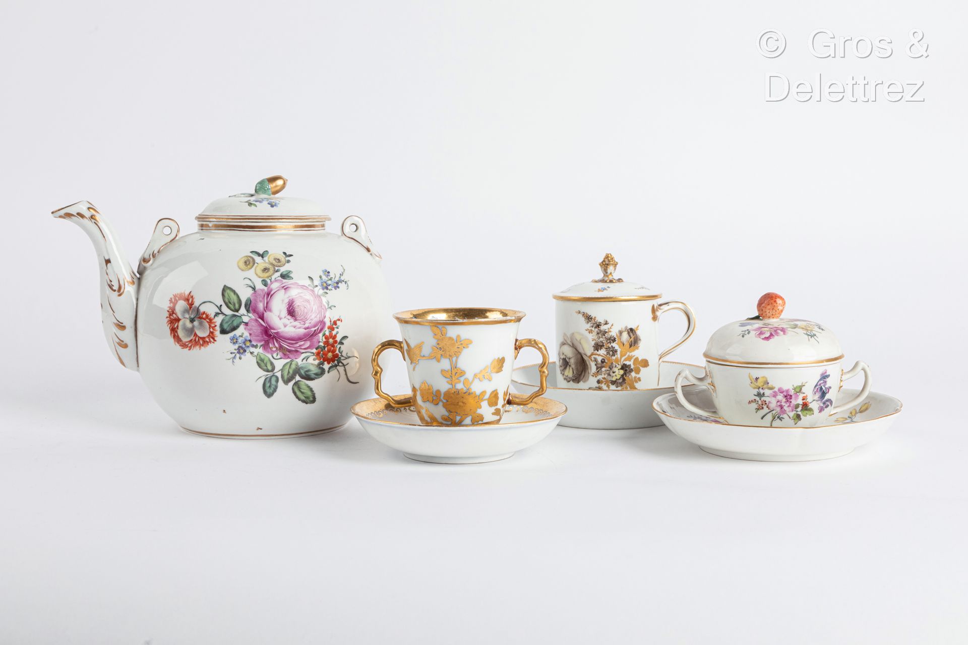 Null Meissen

Three porcelain cups and their saucers, one with two handles decor&hellip;