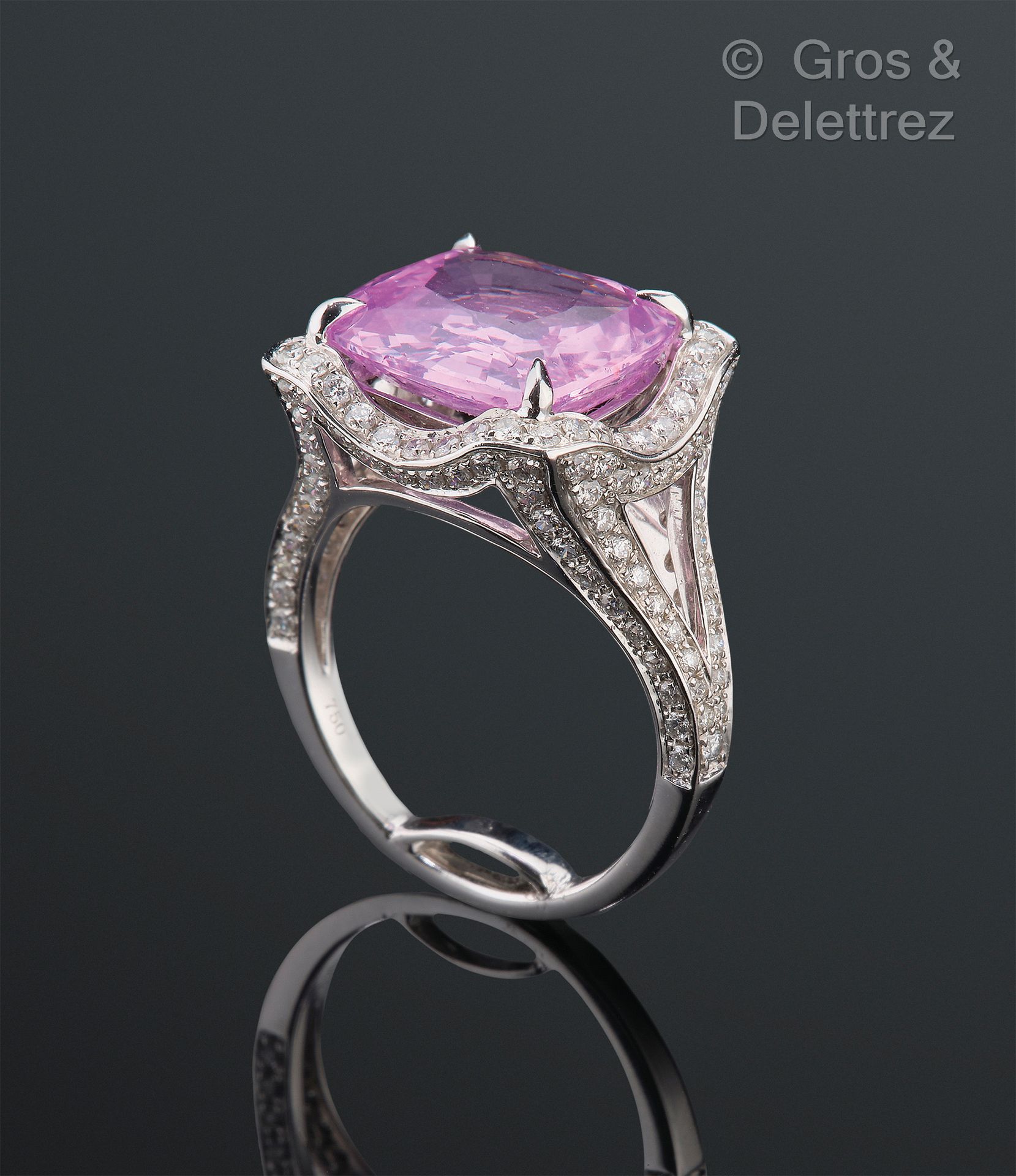 Null Ring in white gold, decorated with a pink sapphire cushion. The ring is set&hellip;