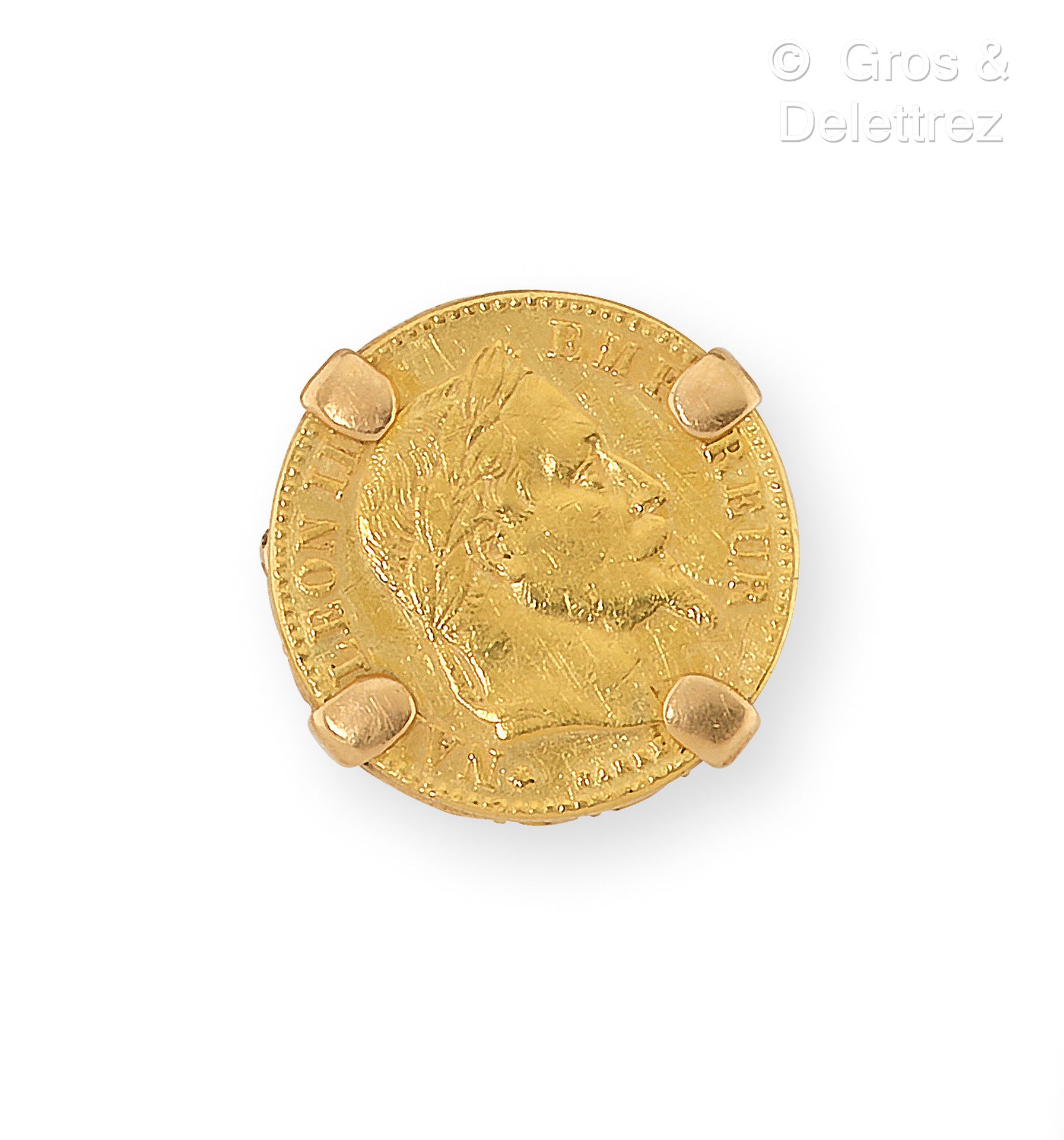 Null 黄金戒指上有一枚10法郎的金币。手指大小：51。毛重：7.1克。