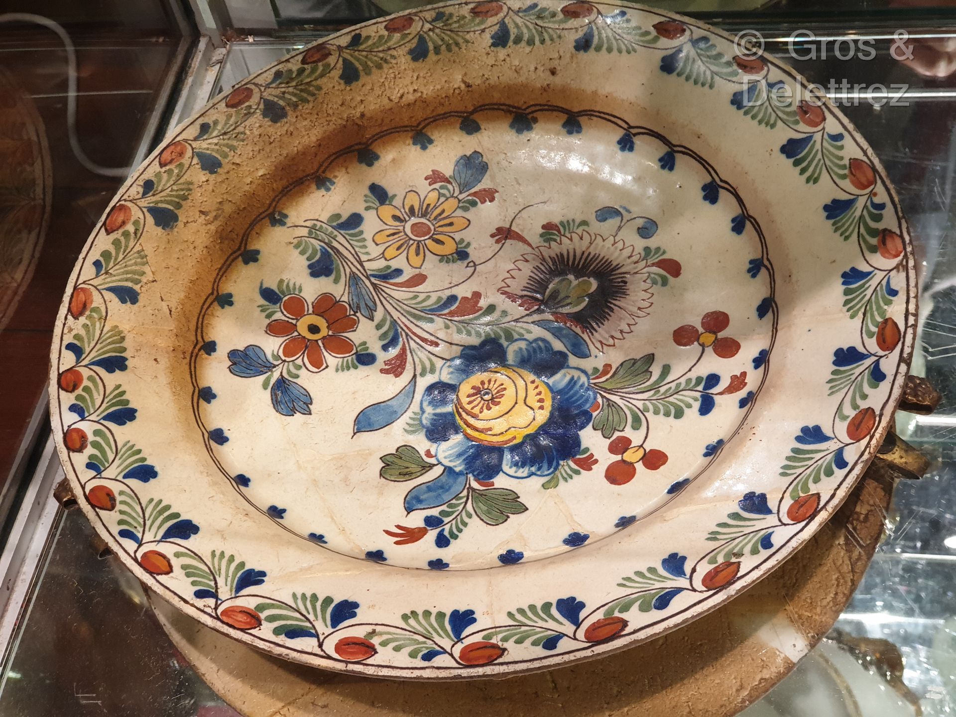 Null (SD) Round dish in Delft earthenware with floral decoration.

Diameter : 34&hellip;