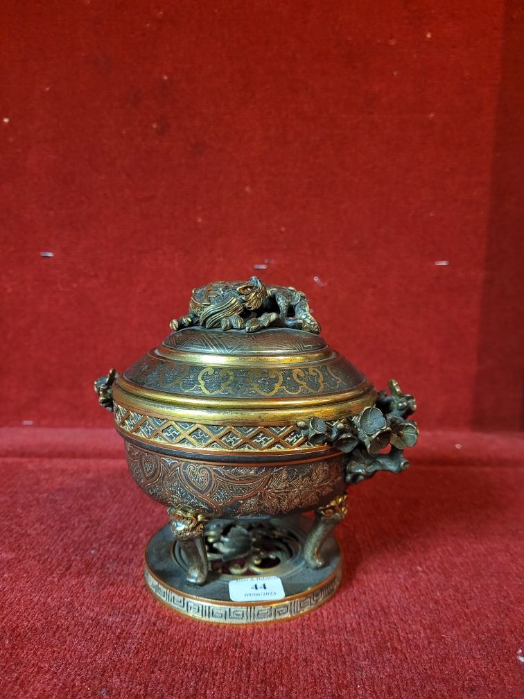 Null Partially nielloed bronze quadripod incense burner with two handles; dragon&hellip;