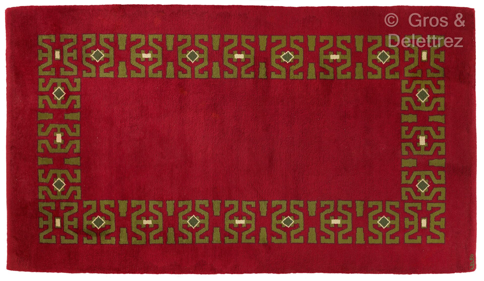 Null leleu装饰
摘自波尔-勒鲁（1906-1987）的一幅漫画
长方形的羊毛地毯，在红色的背景上有一个绿色和米色的植物图案的楣。
已签名。
大约在19&hellip;