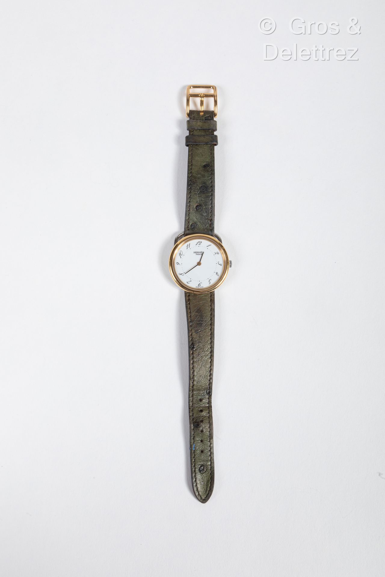 Null HERMES Paris Swiss made n°367009 - Montre "Arceau" en métal doré, cadran bl&hellip;