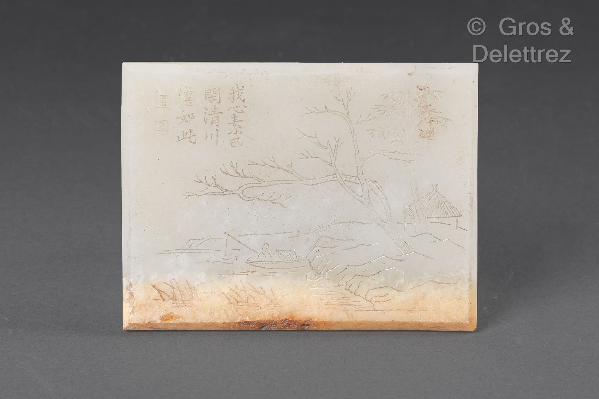 Null Chine, XXe siècle 
Plaque en jade céladon, à décor incisé d’un paysage lacu&hellip;