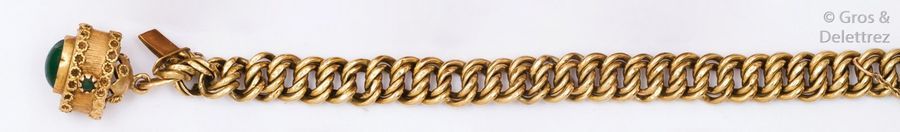 Null Bracelet articulé en or jaune orné d’une breloque sertie d’un cabochon de c&hellip;