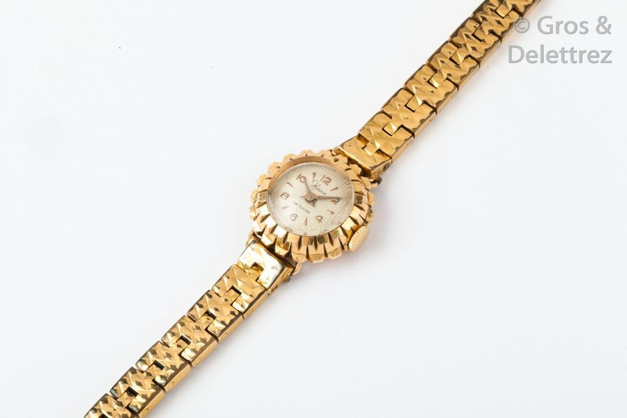 HERMA Bracelet-montre de dame, le boîtier en or jaune, le bracelet en métal. P b&hellip;