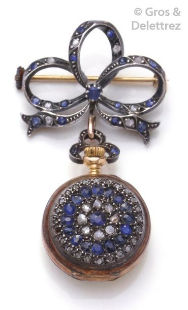 Null Broche porte-montre et sa montre en argent et or jaune ornées de diamants t&hellip;