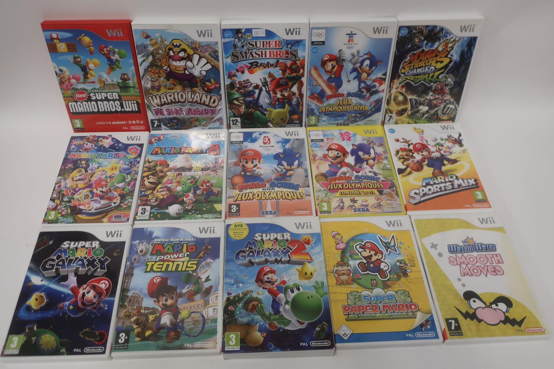 RETROGAMING - Lote de 15 juegos de Mario para WII : - M…