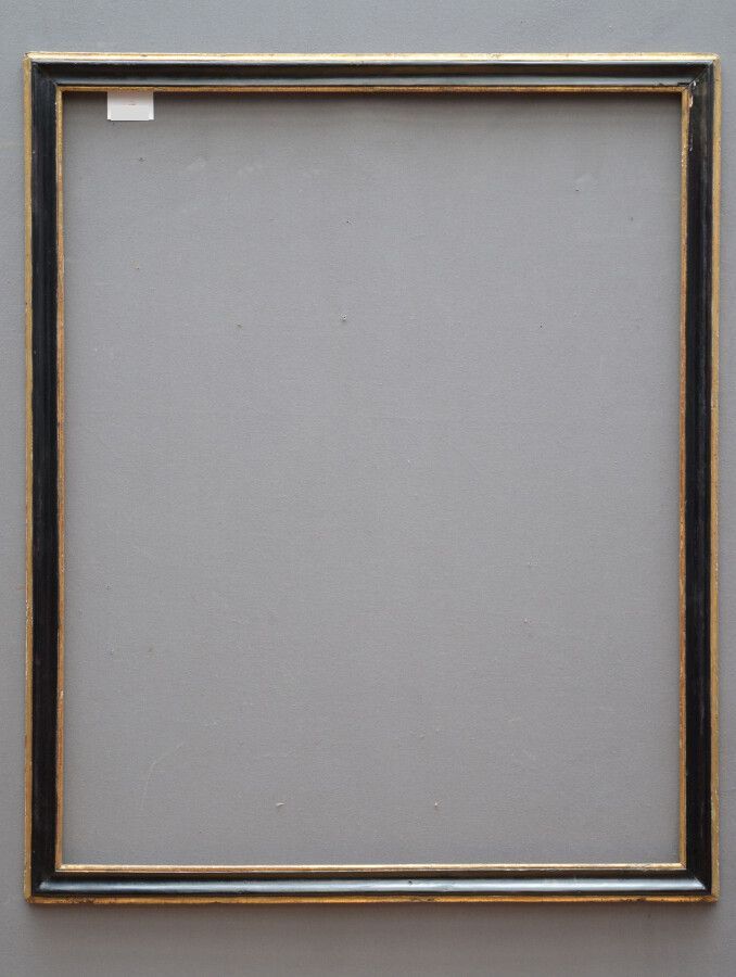 Null 一个模压和发黑的杉木框架，有一个镀金的边框和叶子。

意大利，18世纪

106,5 x 85,5 x 6厘米