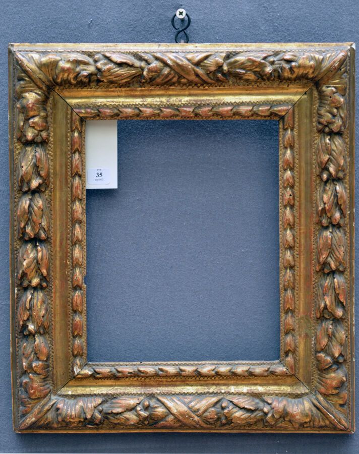 Null Oak frame, carved, molded and gilded, decorated with a frieze of laurel twi&hellip;