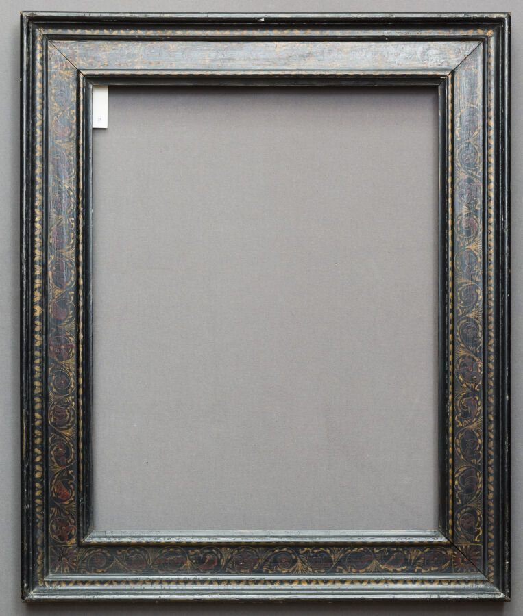 Null Frame said to cassetta, out of moulded wood, blackened, with polychrome dec&hellip;