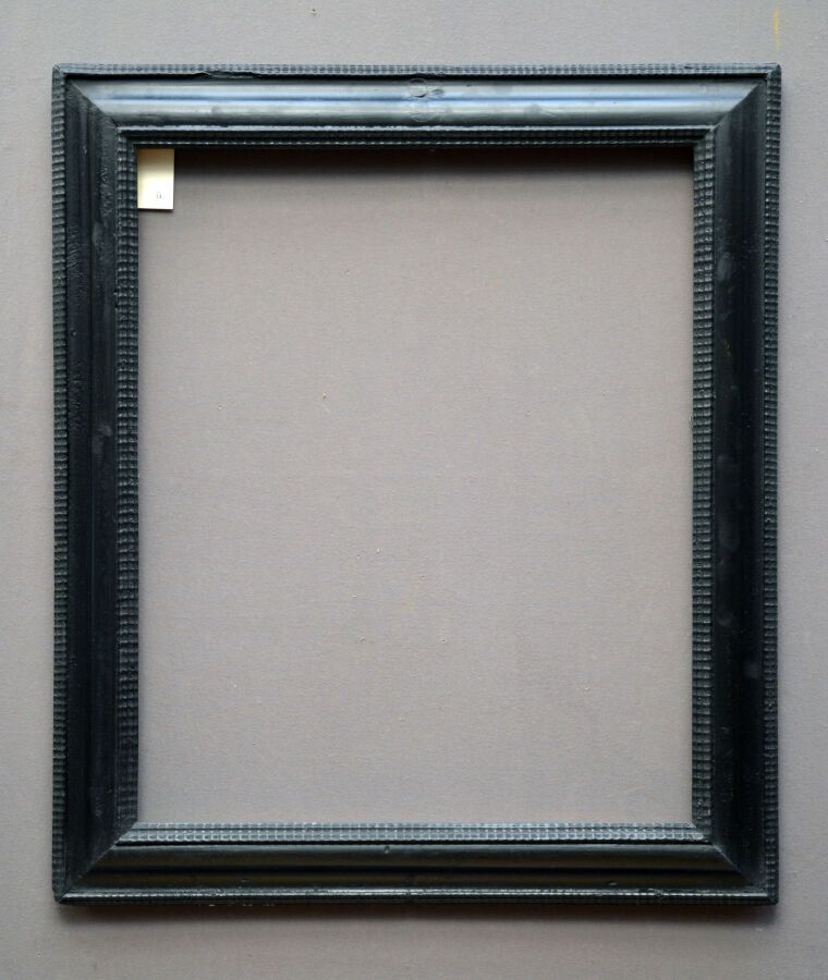 Null 一个模压、雕刻和发黑的木框，上面有玑镂装饰。

意大利，18世纪。

尺寸：75.5 x 62 x 9.5厘米