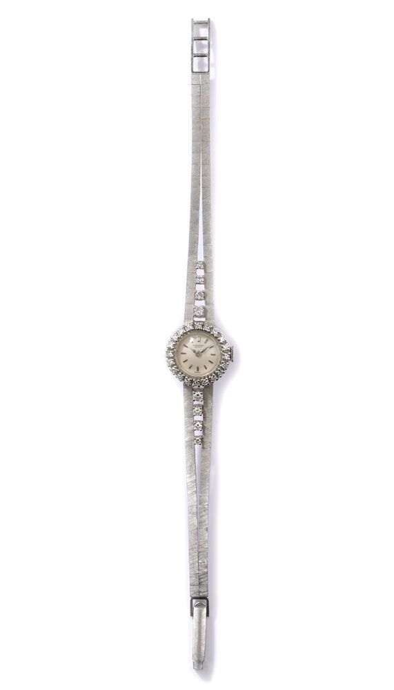 Damenarmbanduhr von IWC IWC 万国表女士腕表
750白金表壳和表链，镶嵌钻石，重27.5克。