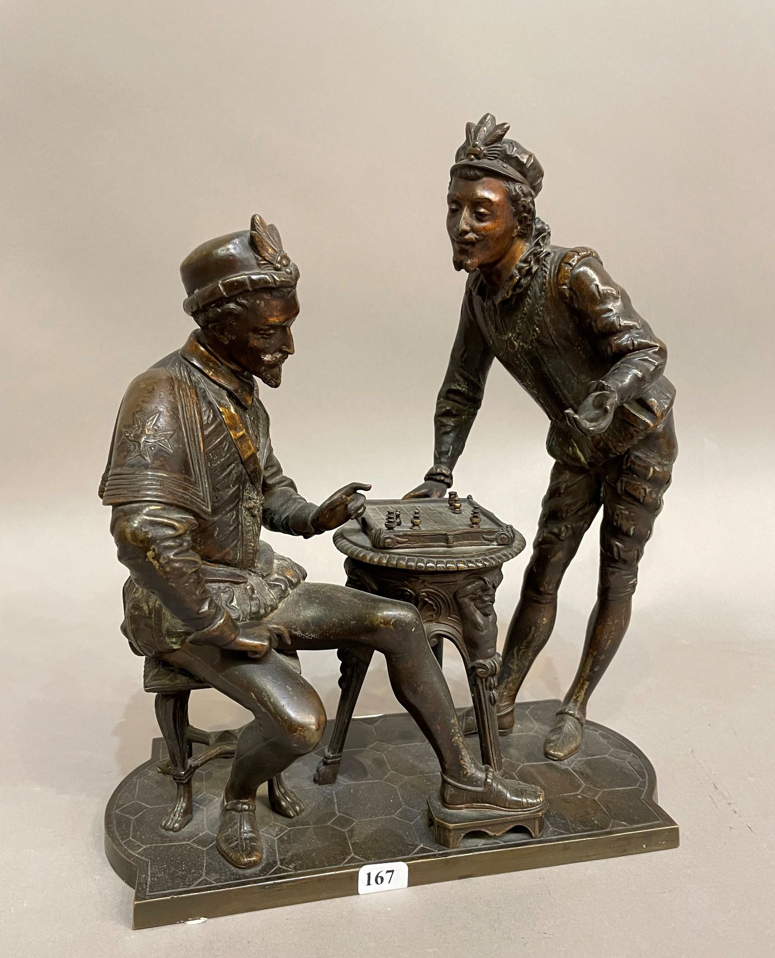 Null "国际象棋选手 "题材的带凹槽和铜化的青铜，19世纪末无签名

H.28厘米 宽24厘米
