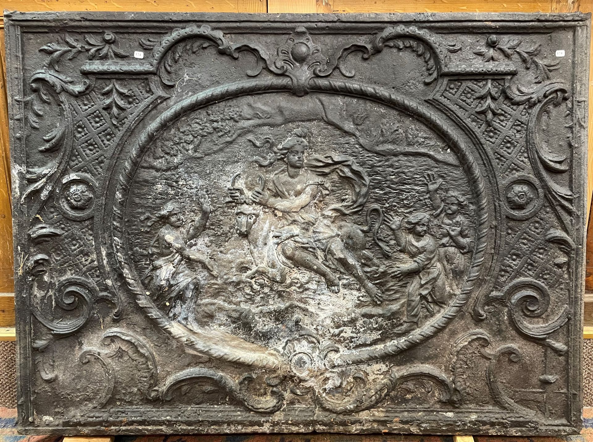 Null Important cast iron fireback representing the abduction of Europa by Zeus

&hellip;