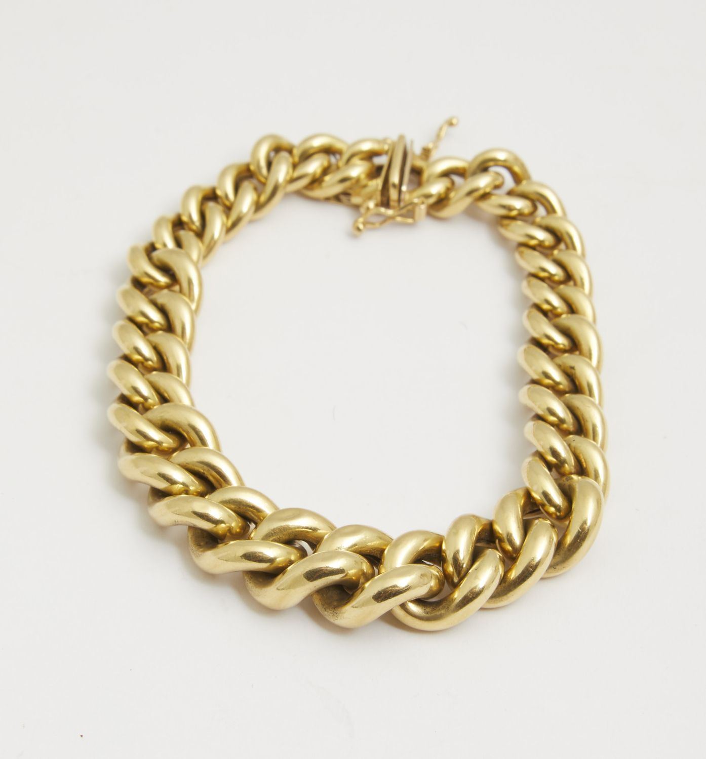 Null 79 Yellow gold curb chain bracelet


27.6g