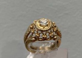 Null 750/°黄金戒指，镶嵌一颗明亮型切割钻石，重约0.30克拉（含）。手指大小：53。 毛重：6.5克。