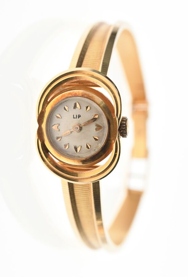 Null LIP - BRACELET WATCH in yellow gold 750/°°°, the round case, cream dial. Me&hellip;