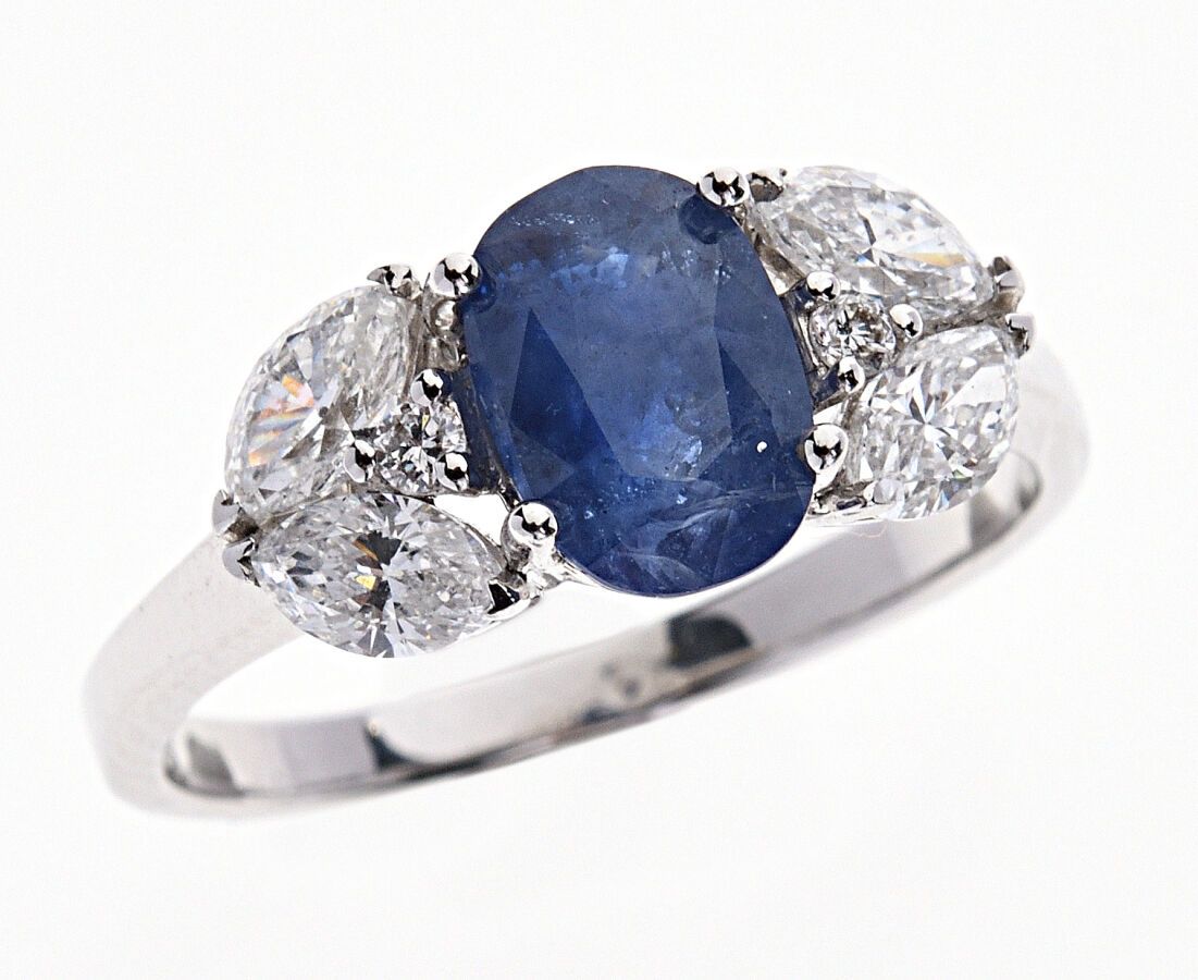 Null White gold "Bandeau" ring set with an oval sapphire weighing approximately &hellip;