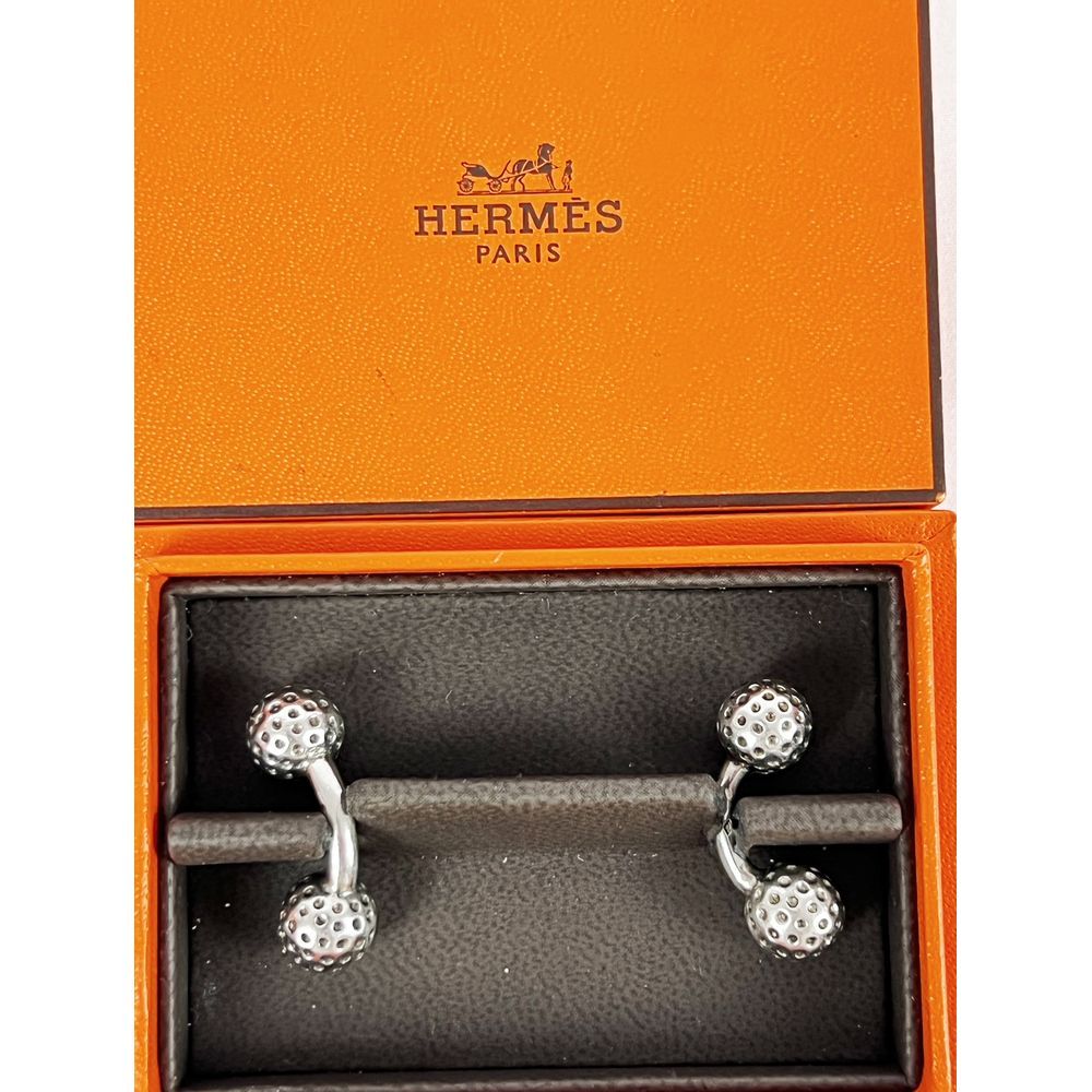 Null HERMES. Pair of cufflinks in silver 925°/°° featuring golf balls. Signed. W&hellip;
