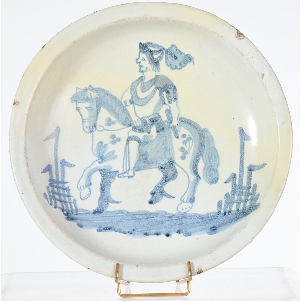 Null VRON or HESDIN. Earthenware dish with a rider decorated in blue monochrome &hellip;